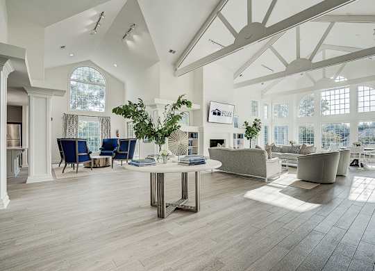 A spacious living room with a large table and chairs. at Sunscape Apartments, Roanoke, VA, 24018