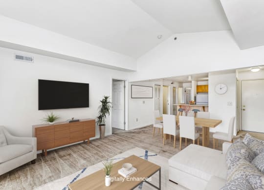 a dining room with a high ceiling at Tall Oaks Apartment Homes, Michigan