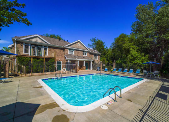 Outdoor Pool with Large Sundeck at Tall Oaks Apartment Homes, Kalamazoo, MI, 49009