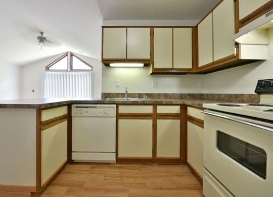 Kitchen with Dishwasher at Tanglewood Apartments in Oak Creek, WI