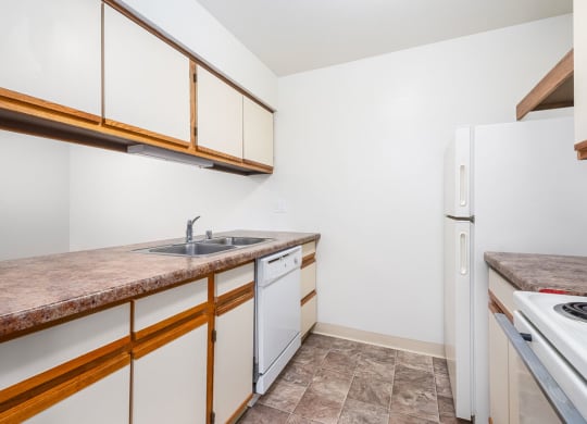 a kitchen with a dishwasher at Tanglewood Apartments, Oak Creek, WI