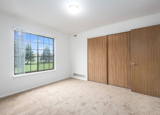 Bedroom with large closet at Tanglewood Apartments, Oak Creek, 53154