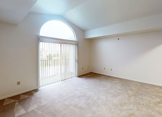 two bedroom living room with a cathedral ceiling  at Tracy Creek Apartment Homes, Perrysburg