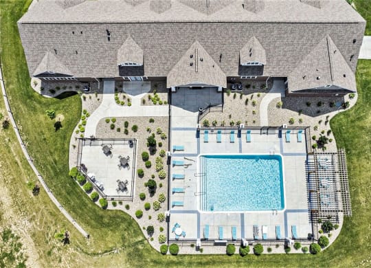 aerial view of outdoor pool and sundeck at Trade Winds Apartment Homes in Elkhorn, NE