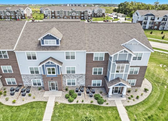 an aerial view of buildings at Trade Winds Apartment Homes in Elkhorn, NE 68022