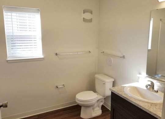 Bathroom with Hard Surface Flooring at Trade Winds Apartment Homes in Elkhorn, NE