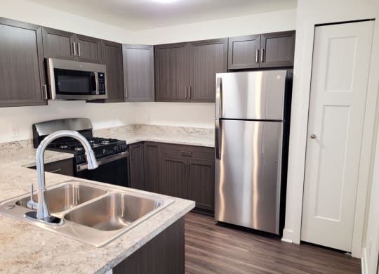 One Bedroom Modern Kitchen with Pantry at Trade Winds Apartment Homes, Elkhorn, NE