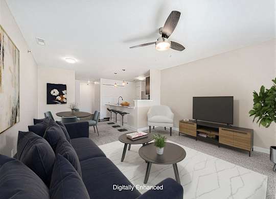 living room with a ceiling fan at Trade Winds Apartment Homes, Elkhorn, Nebraska