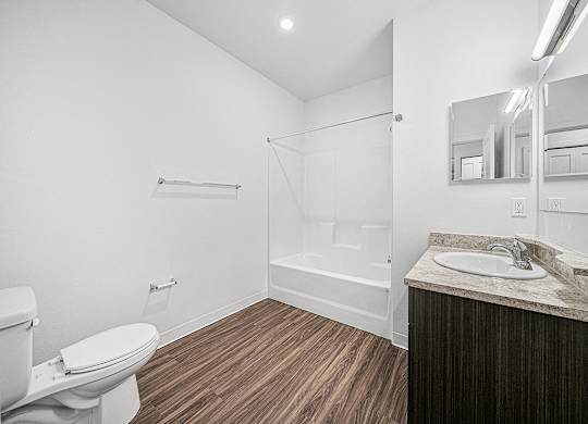main bathroom with hard surface flooring at Trade Winds Apartment Homes, Elkhorn, NE