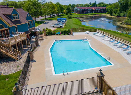 Blue Cool Swimming Pool at Trappers Cove Apartments, Lansing, 48910