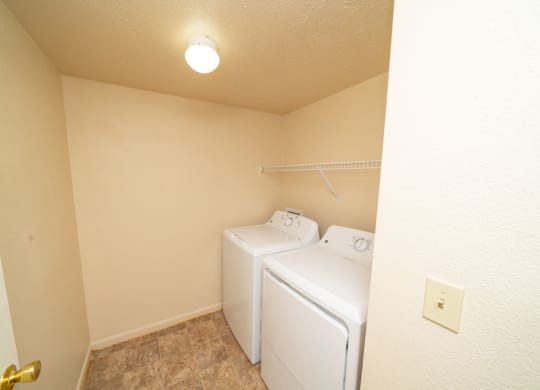 Separate Laundry Room at Trillium Pointe Apartment Homes in Jackson, MI