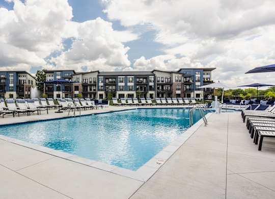 Swimming Pool Area With Shaded Chairs at Upper Vue Flats, Dublin, OH, Ohio, 43016
