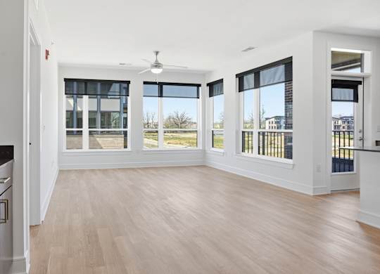 A kitchen with a black countertop and wooden floors at Upper Vue Flats, Dublin
