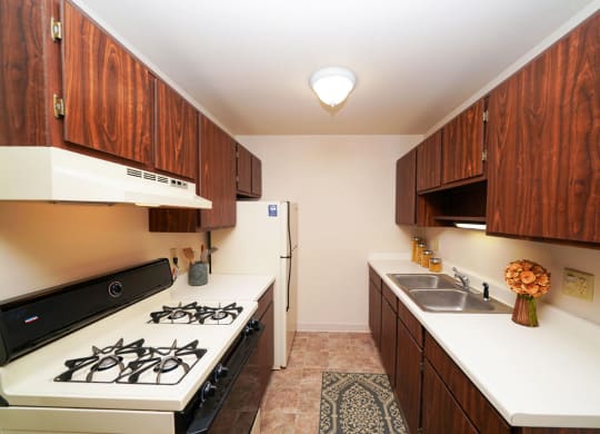 Fully Equipped Kitchen at Walnut Trail Apartments in Portage, MI
