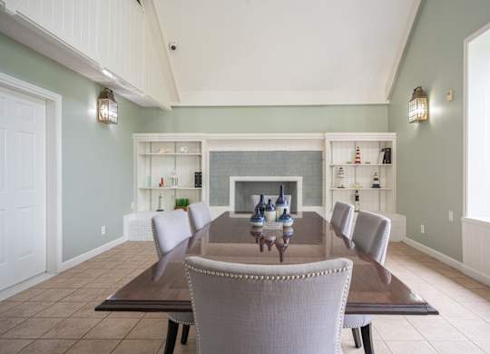 A dining room with a table and chairs at WaterFront Apartments, Virginia Beach, 23453