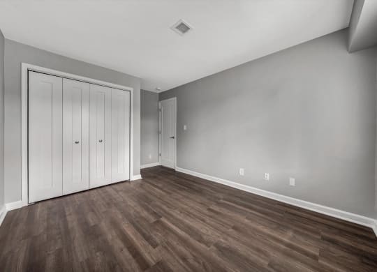 Comfortable Bedroom With Accessible Closet at WaterFront Apartments, Virginia Beach, VA