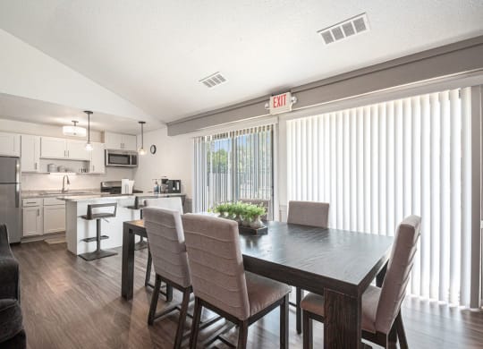 Renovated kitchen with dining area at West Wind Apartments, Fort Wayne, IN