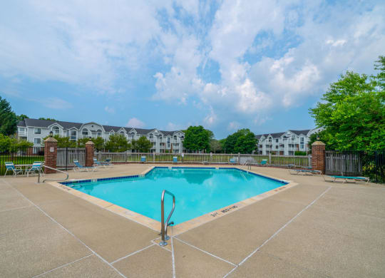 Swimming Pool with Large Sundeck at Windmill Lakes Apartments in Holland, Michigan
