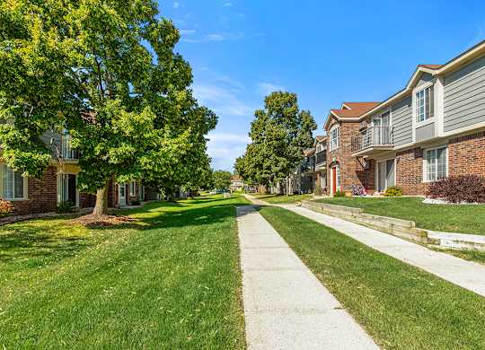 A walkway between apartment buildings at Wood Creek Apartments, Wisconsin