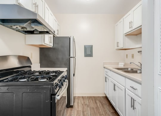 White Shaker-Style Cabinetry Private Balcony at Wood Creek Apartments in Kenosha, WI