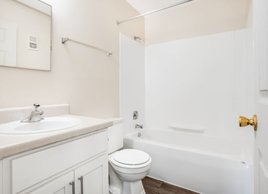 Renovated Bathroom Private Balcony at Wood Creek Apartments in Kenosha, WI