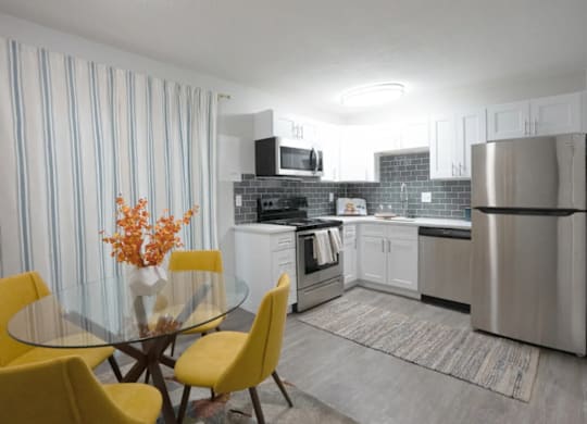 A modern kitchen with a glass table and yellow chairs.