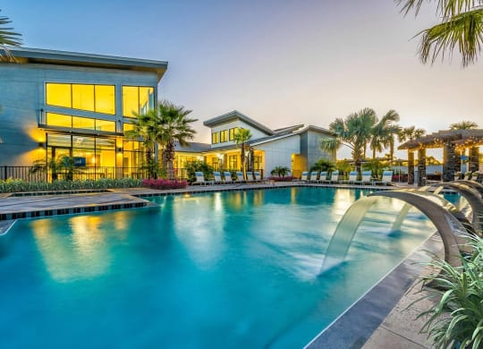 Swimming Pool With Sparkling Water at Pearce at Pavilion Luxury Apartments, Riverview, FL, 33578