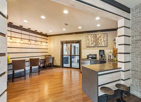 Resident clubhouse with Coffee machine, kitchen and seating
