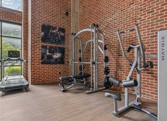 A gym with a variety of equipment.