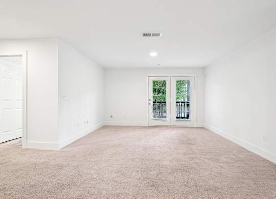Living room with carpet and window