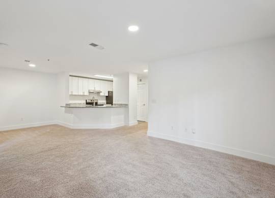 Living room with view of kitchen