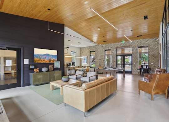 Resident Clubhouse with seating, billiards, and a tv