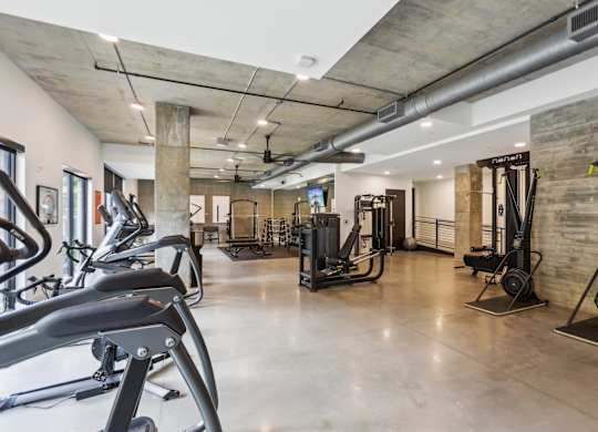 A gym with a variety of equipment