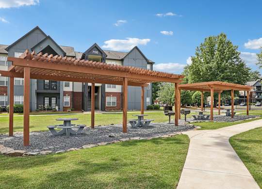Grills and outdoor tables  under pergola