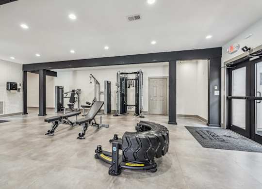 A gym with a variety of equipment