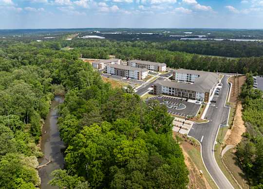 A bird's eye view of Heron Mill apartments with direct access to Sweetwater Creek State Park