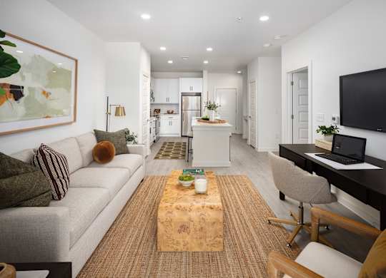 our one bedroom floorplan with a full size kitchen and living room