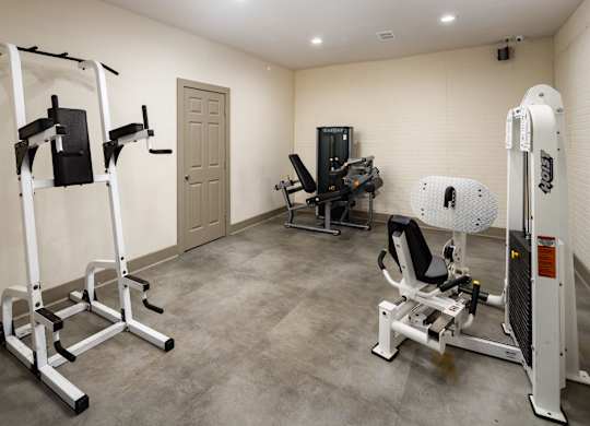 A gym with a variety of equipment
