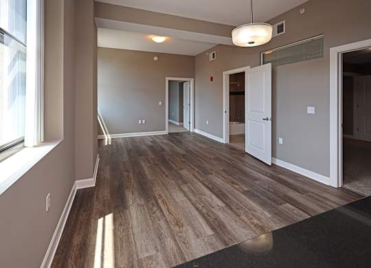 Model Suite with All New LVT Hard Surface Flooring at The Residences at Hanna in Cleveland OH - Living Area