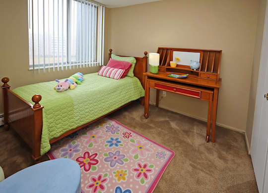 2 Bedroom 1 Bath Model Suite Bedroom at Harbor Crest Apartments in Euclid OH