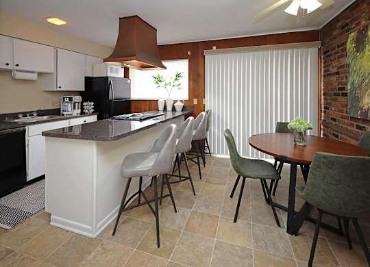 Model Kitchen and Dining Area at Colonial Park Townhomes in Euclid OH