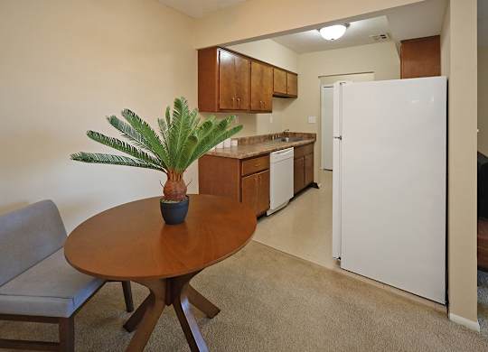 Model Suite Dining Area and Kitchen at Westbrook Village Apartments in Brooklyn OH
