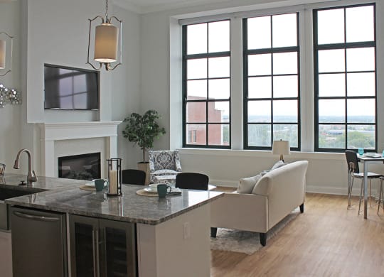 Luxury Vinyl Plank Flooring In Kitchen And Living Room at Residences at Halle, Cleveland