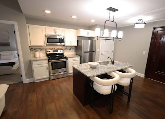Kitchen with Island at Residences at Leader, Cleveland, OH, 44114