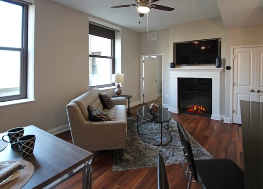 Living Room With Fireplace at The Terminal Tower Residences Apartments, Ohio