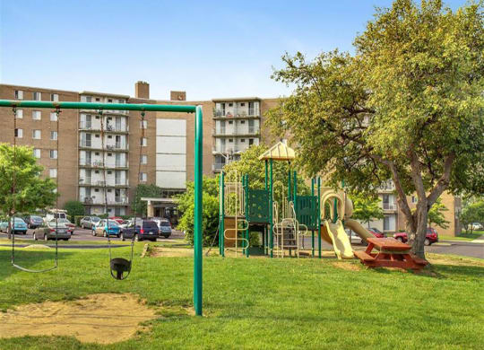 Outdoor Playground and Picnic Area at Trinity Towers Apartments, Bedford Heights, 44146