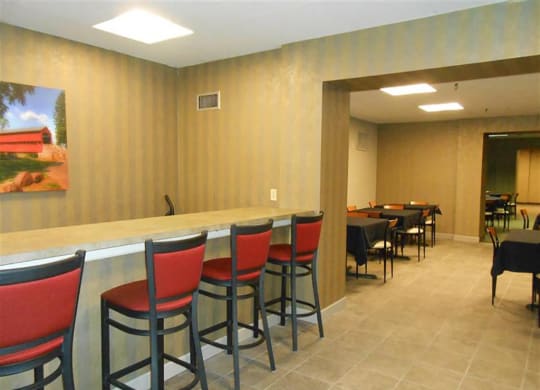 Clubhouse with chair and table at Willoughby Hills Towers, Ohio, 44092