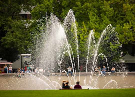 Public splash pad fountain with spray features at Axis Seattle Apartments, Seattle