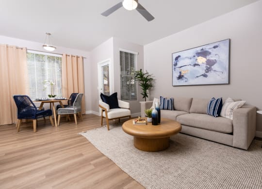 a living room with a couch and a table