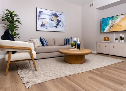 a living room with a couch and a table